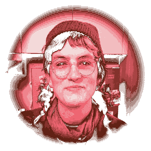 Addie's face, smiling in glasses and pigtails.